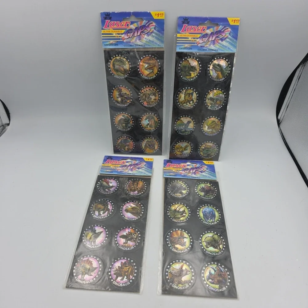 Jurassic Pogs On‎ Sheet Lot Of 32 Dinosaurs Laser Caps USA VTG NEW